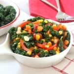 Spicy, Garlic-Braised Kale, Carrot and Corn Medley in a large bowl